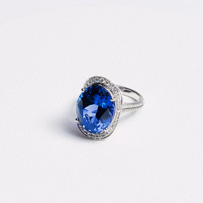 Oval Tanzanite Halo Ring with Pavé Band · 13.42ct · 14K White Gold