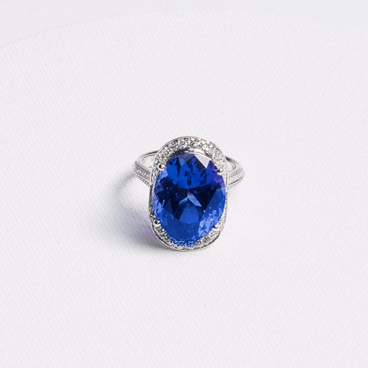 Oval Tanzanite Halo Ring with Pavé Band · 13.42ct · 14K White Gold
