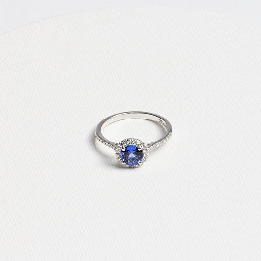 Round Tanzanite Ring with Diamond Halo · 0.91ct · 14K White Gold