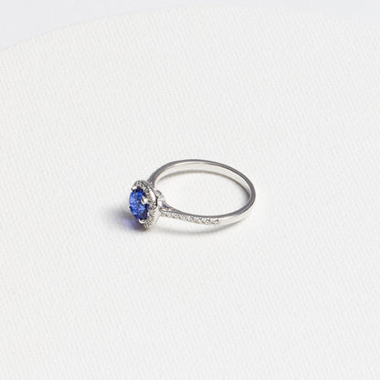 Round Tanzanite Ring with Diamond Halo · 0.91ct · 14K White Gold