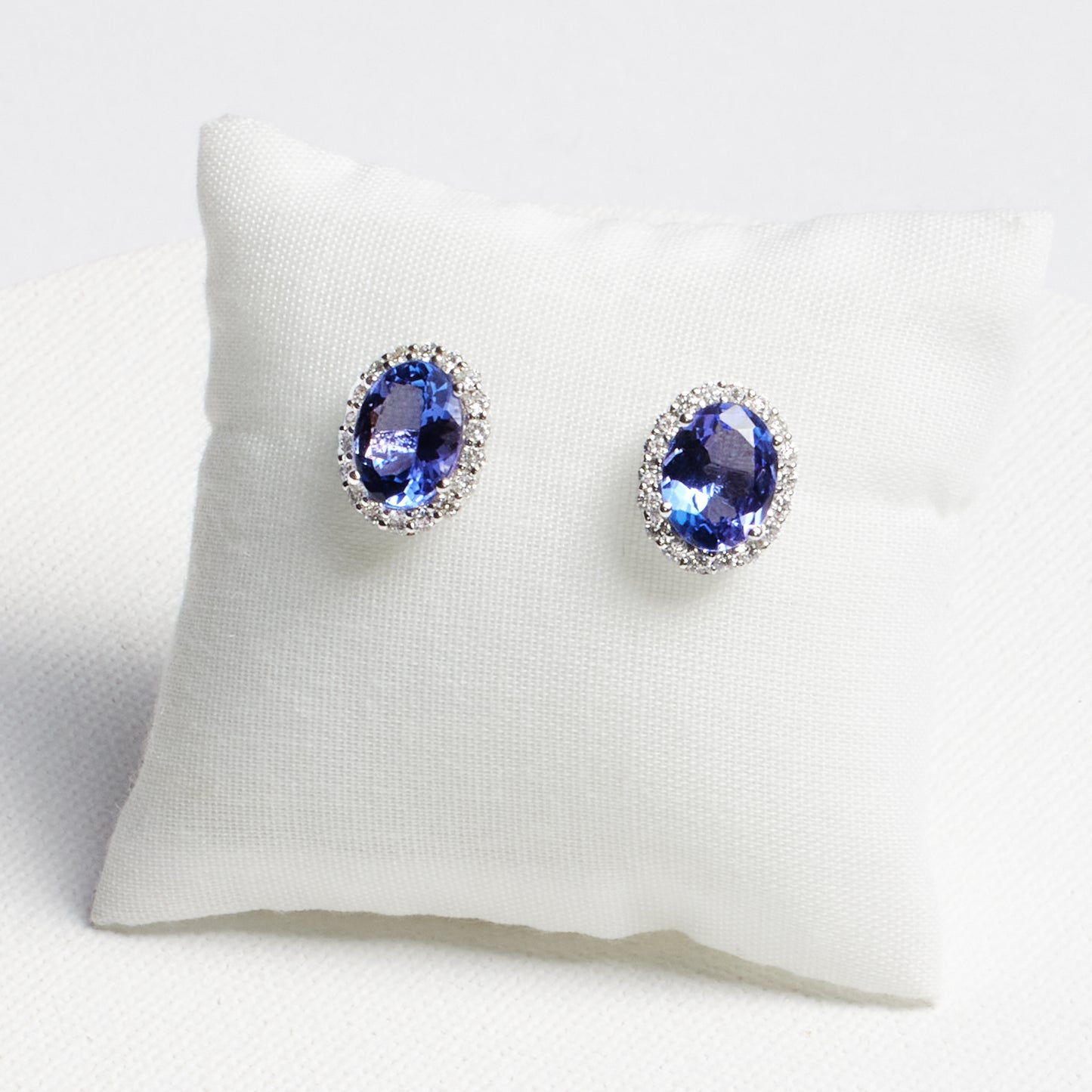 Oval Tanzanite Stud Earrings with Diamond Halo · 3.85ct · 18K White Gold
