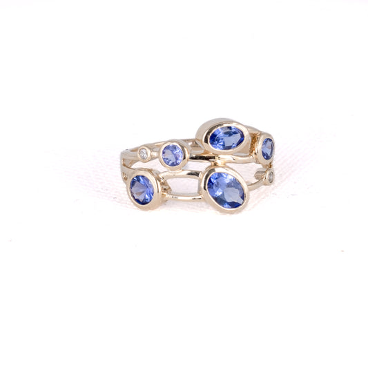 Mixed-Cut Tanzanite Ring with Diamond Accents · 1.07ct · 10K Yellow Gold