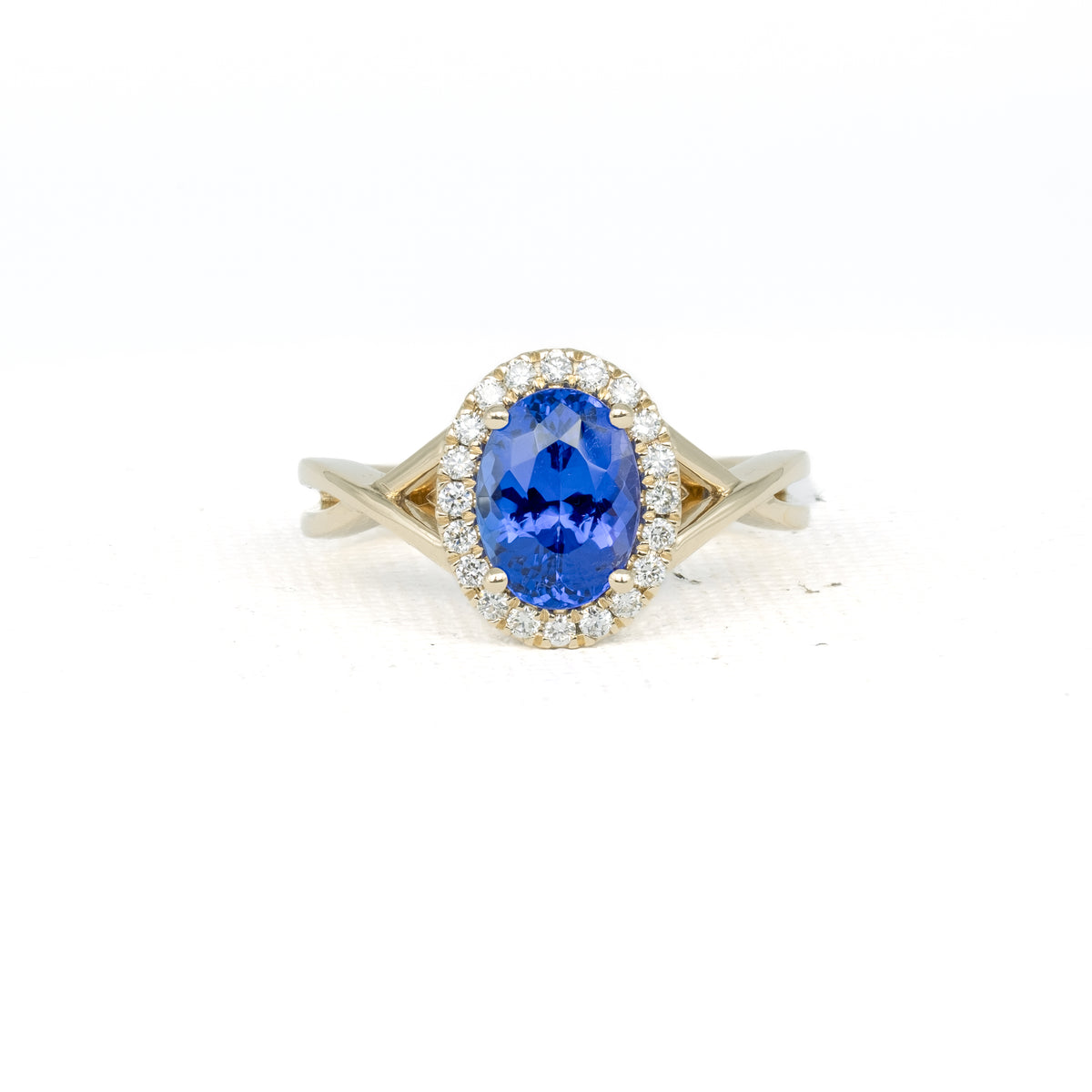 Oval Tanzanite Ring with Diamond Halo · 1.82ct · 14K Yellow Gold